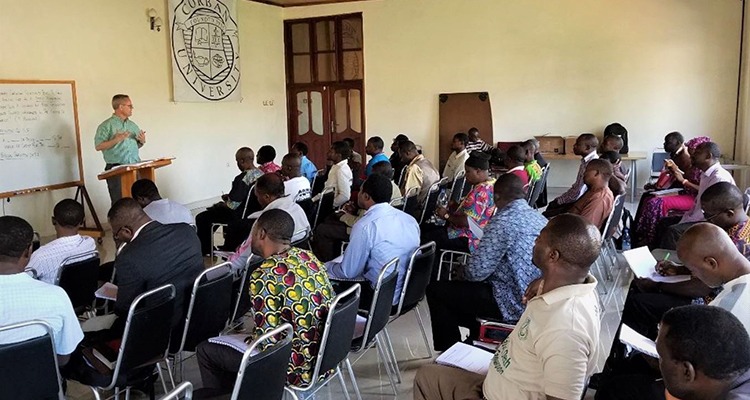 Dr. Sam Baker teaches a group of Cameroonian pastors