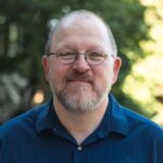 Portrait of Professor Ken Driver, Assistant Professor of Business