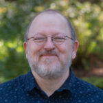 Portrait of Professor Ken Driver, Assistant Professor of Business
