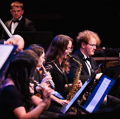 An ensemble of brass musicians performing at the Spring Showcase concert.