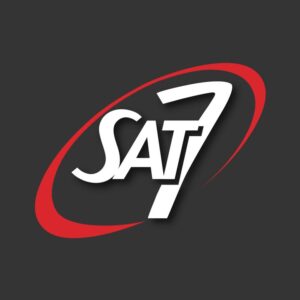 Logo with the text "SAT 7" circled by a red oval and displayed on a dark gray background.