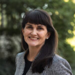 Portrait of Holly Flores, Executive Assistant to the President and VP for Advancement