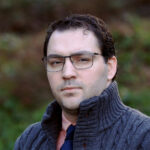 Portrait of Cole Burgett, Assistant Director of Online and Nontraditional Learning