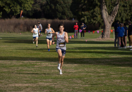 Corban University cross country runner Stephen Crover competes during a race.