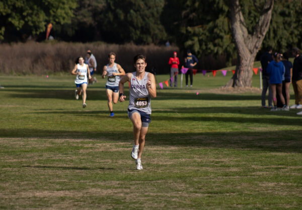 Corban University cross country runner Stephen Crover competes during a race.